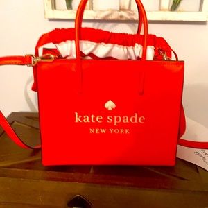 Beautiful tangerine colored Kate Spade purse.